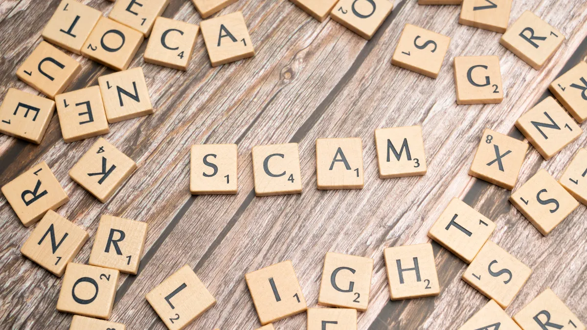 How to spot website marketplace scams and fake buyers: red flags and verification steps — Scrabble letters spelling scam