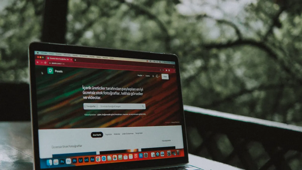 How to value a website: step‑by‑step valuation for content sites, SaaS and e‑commerce — Website Displayed on a Laptop St